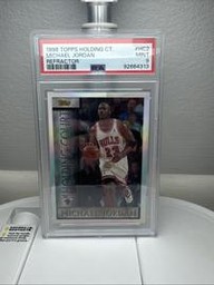 Holding Topps (PSA)